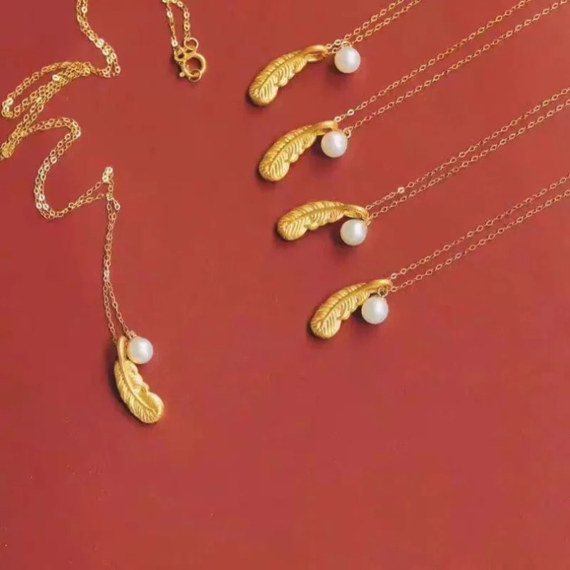 

18K gold natural pearl necklace 3D hard gold feather freshwater pearl pendant collarbone chain women's boutique jewelry gift
