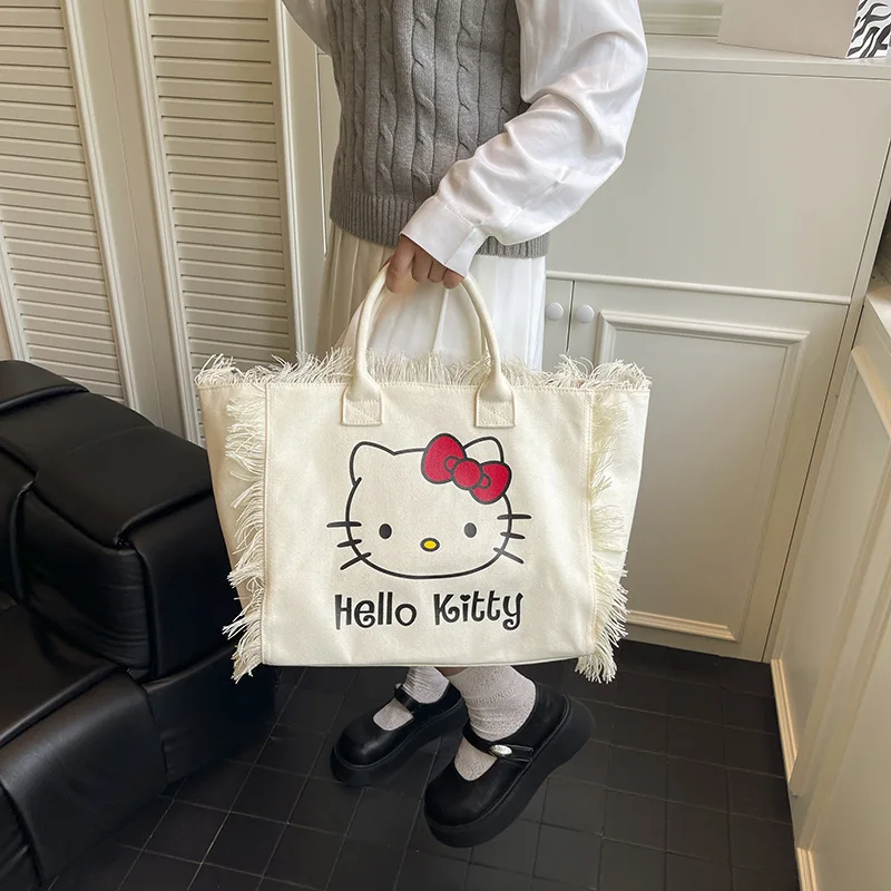 

Новинка 2024 года, холщовая сумка Sanrio Hellokitty с кисточками, Kawaii, модная ручная сумка на плечо большой вместимости, подарки для девочек