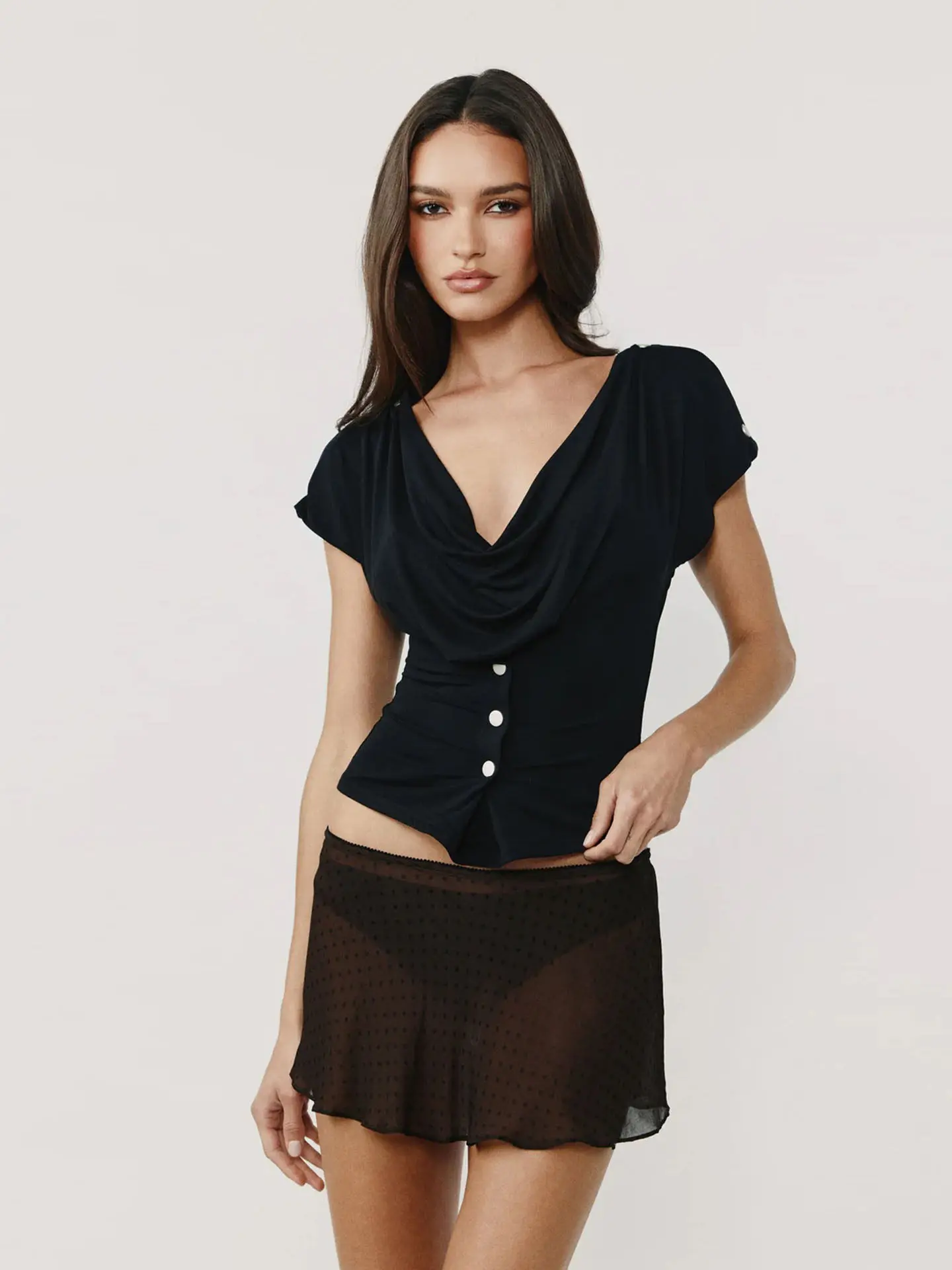 With Jean Off-White Round Neck Cinched-Waist T-Shirt and Black One-Shoulder Asymmetrical Cut Short-Sleeved Top