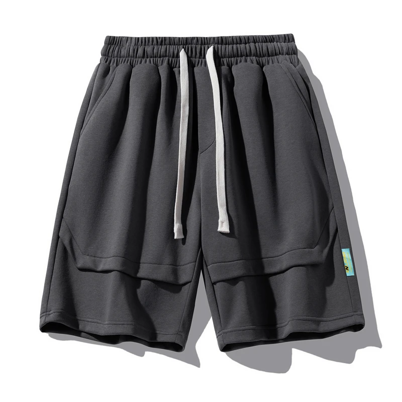 Fashion Spliced Lace Up Solid Color Casual Shorts Men's Clothing 2024 Summer New Loose Elastic All-match High Waist Knee Shorts