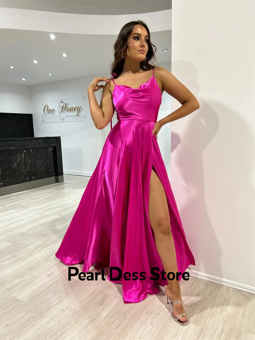 

Minimalist satin evening dress with thin shoulder straps and purple red side slits. Customized ball dress for special occasions