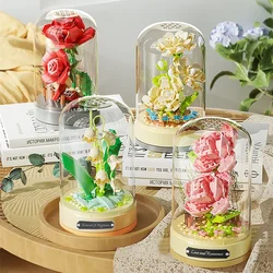 Building blocks music box Clockwork rotating music box Building blocks Rose Lily of the valley puzzle set Valentine's Day gift