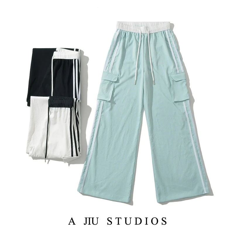 กางเกงทำงานลายทางสไตล์อเมริกันสำหรับผู้หญิง กางเกงลำลองทรงหลวมสำหรับฤดูร้อน กางเกงกีฬาขายาวทรงกว้าง กางเกงสีดำ สไตล์สาวฮอต