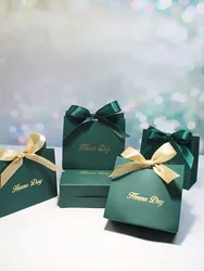 Luxurious 'Henna Day' Dark Green Gift Boxes with Golden Ribbons, Ideal for Wedding Celebrations and Special Gift Giving