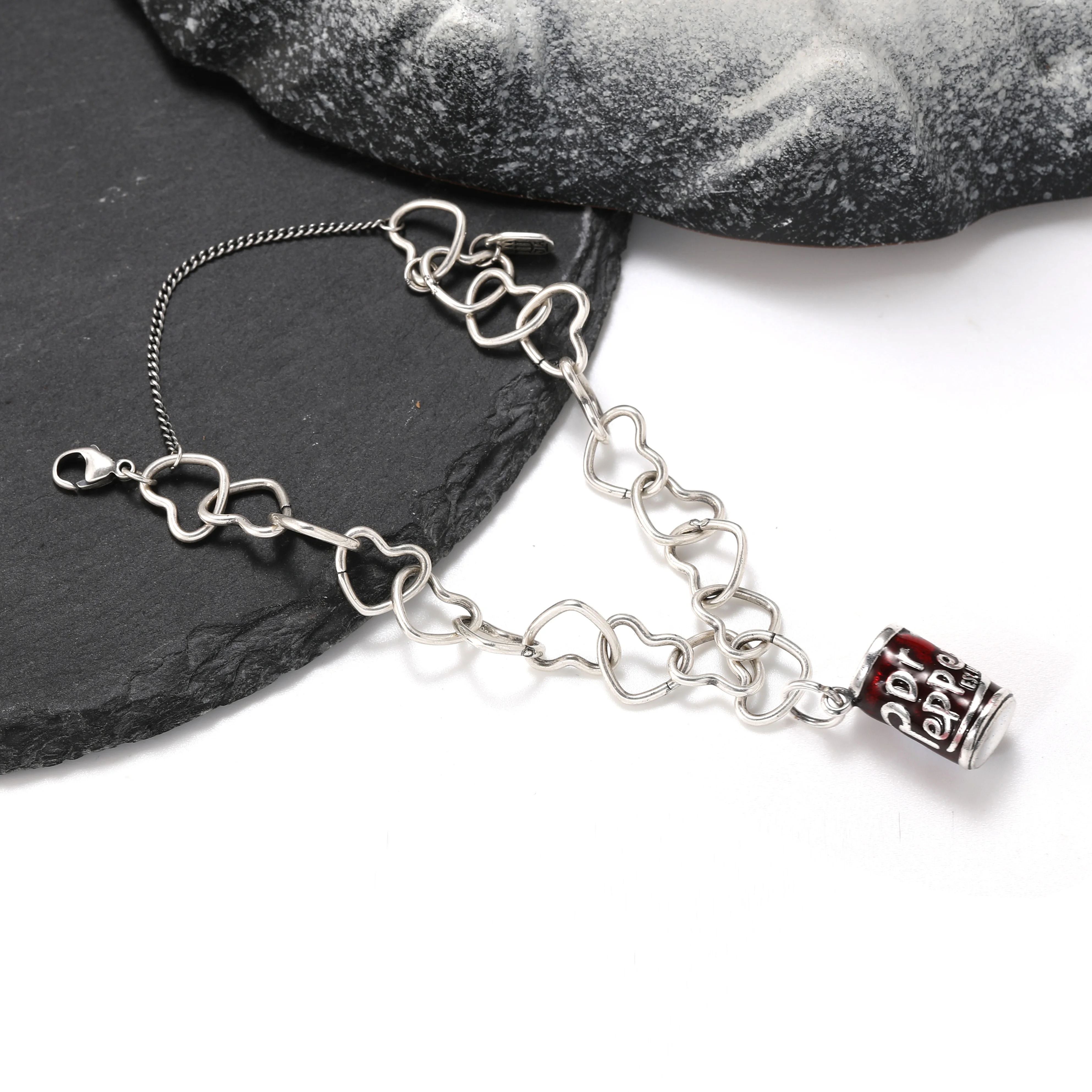 

Genuine 925 sterling silver Connected Hearts Charm Bracelet paired with Enamel "Pepper Doctor" pendant
