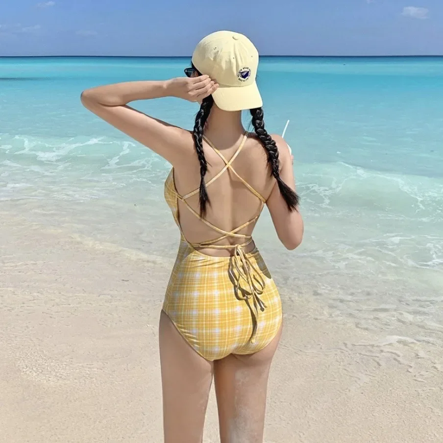 Traje de baño de una pieza adelgazante con espalda descubierta a cuadros de primavera térmica de estilo coreano para mujer diseño de vendaje Sexy nueva gran oferta del mar