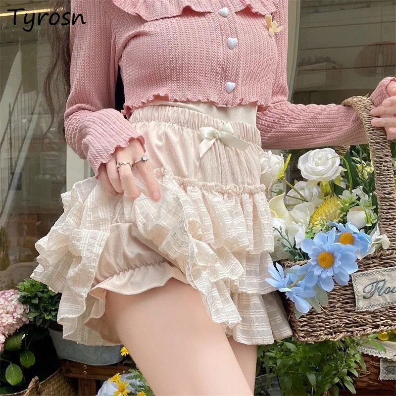 Mini spódniczki z kokardą z wysokim stanem damska suknia balowa z falbankami Lolita styl japoński słodkie dziewczyny plisowane warstwowe Kawaii wróżka romantyczny szyk