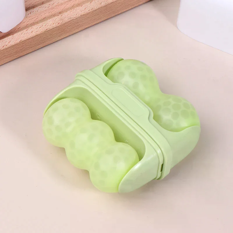 Rouleau de glace pour le visage à Double tête, utilisé pour le massage du visage et de la tête, en matériau en résine, sans parfum ni batterie