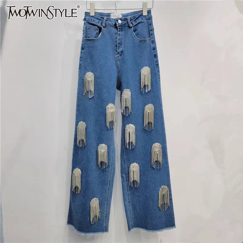 

TWOTWINSTYLE Solid Loose Spliced Tassels Fashion Jeans for Women High Waist Patchwork Pockets Minimalism Pants Female Clothing