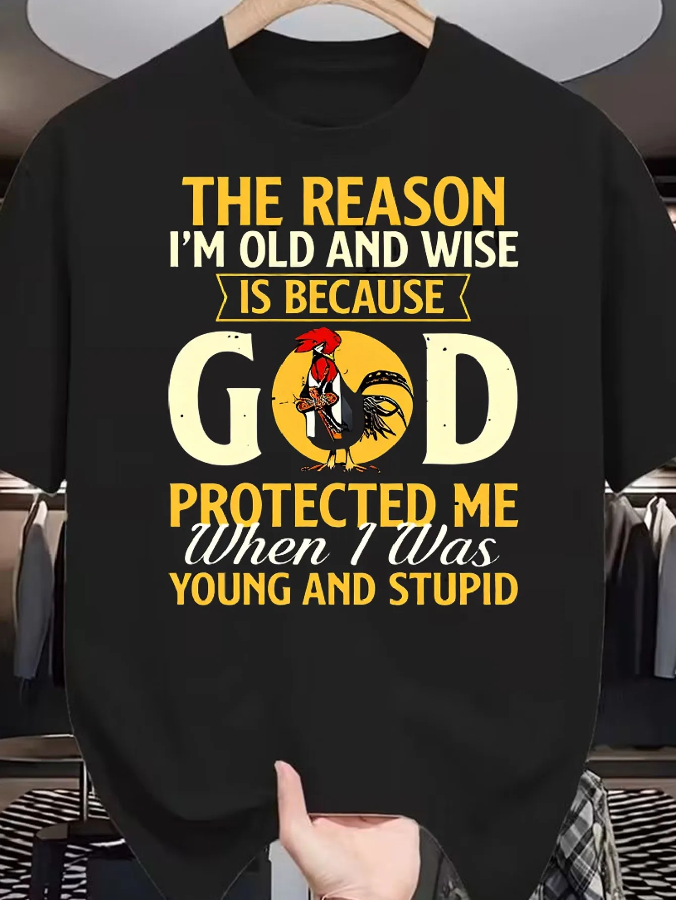 [Plus Size Graphic T-Shirt] Black Plus Size Casual Tee for Men - Humorous Design 'THE REASON I'M OLD AND WISE IS BECAUSE GOD PROTECTED ME When I Was YOUNG AND STUPID' with Colorful Text and Red-Roo