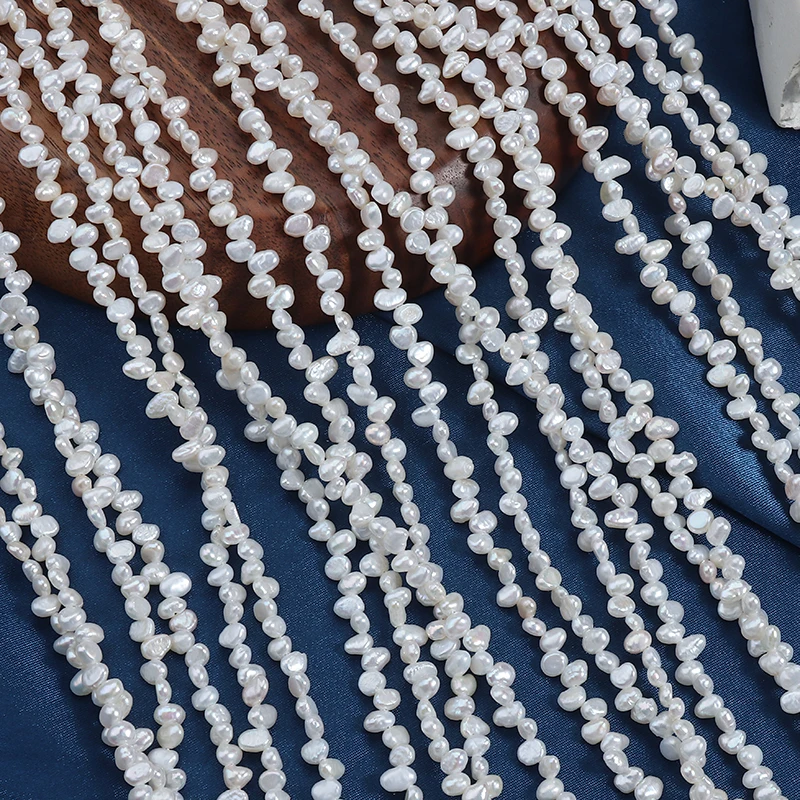 3-4mm mini natural freshwater Sanqi, smooth on both sides, irregular shape, extended length 39cm.