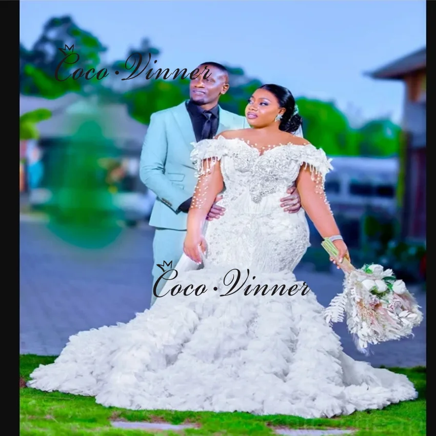 

Customized Sparkle Cystal Beaded Mermaid Wedding Dress 2026 Illusion Sleeves Tulle Ruffles Mermaid Wedding Dresses Africa W1475