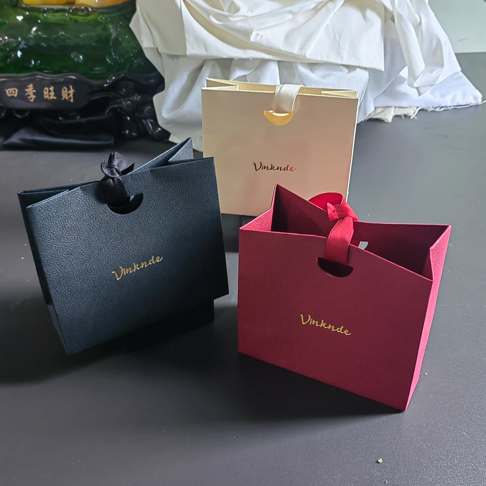 Bolsa de embalaje de Perfume de lujo, 30/50 Uds., logotipo personalizado, bolsas de mano para joyería, compras, cosméticos, anillo, collar, organizador, bolso