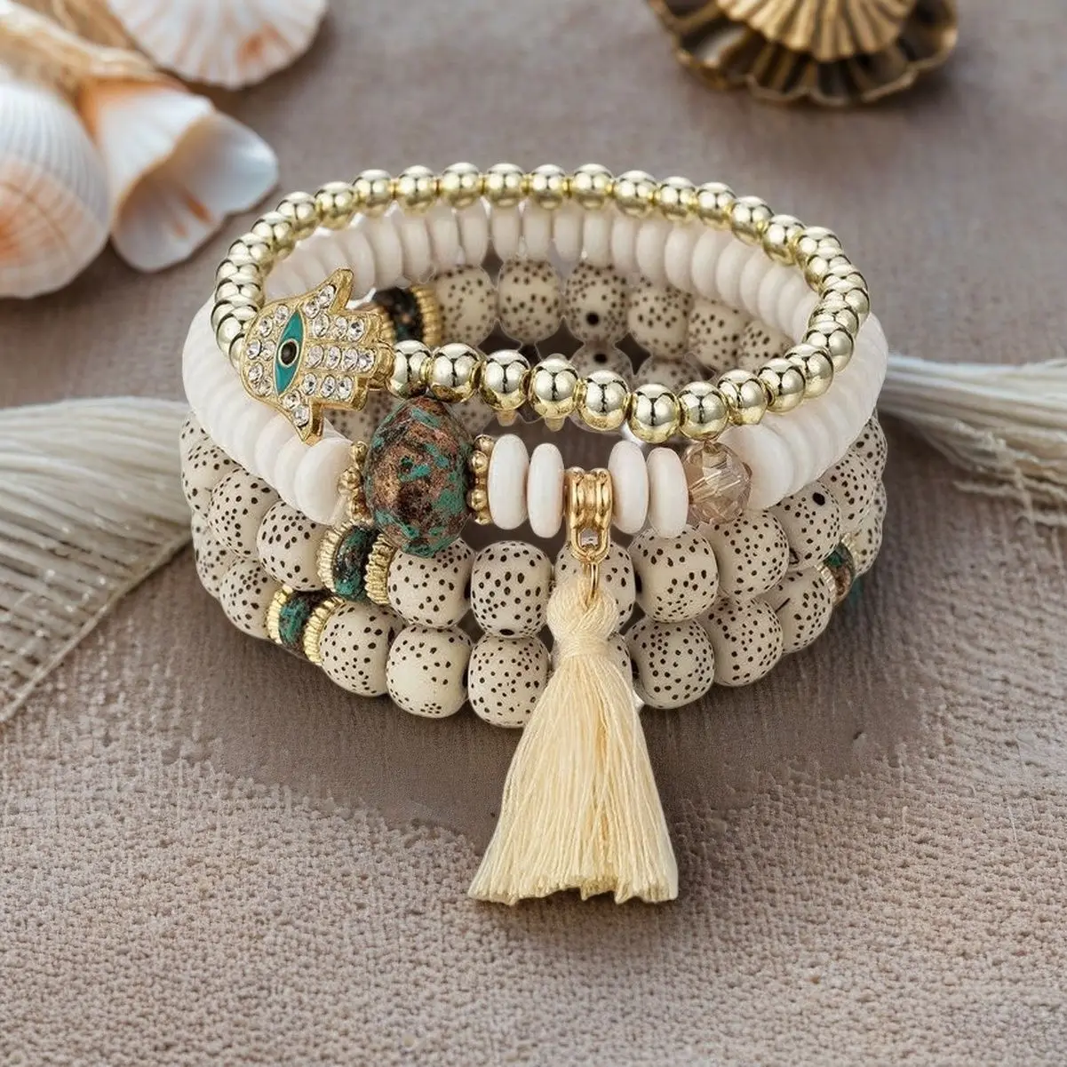 4-teiliges Armband-Set mit dem Motiv des „bösen Auges“ für Damen, mit Kristallanhänger in Form der Hand Fatimas, Quasten, elastischen Perlen und Kettengliedern, Herren-Modeschmuck und Accessoires. – Detail 2