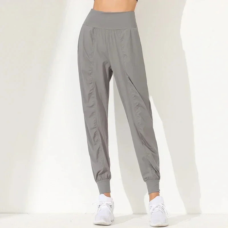 Nuovi pantaloni da yoga Casual Slim Fit ad asciugatura rapida pieghettati da corsa Fitness Capris