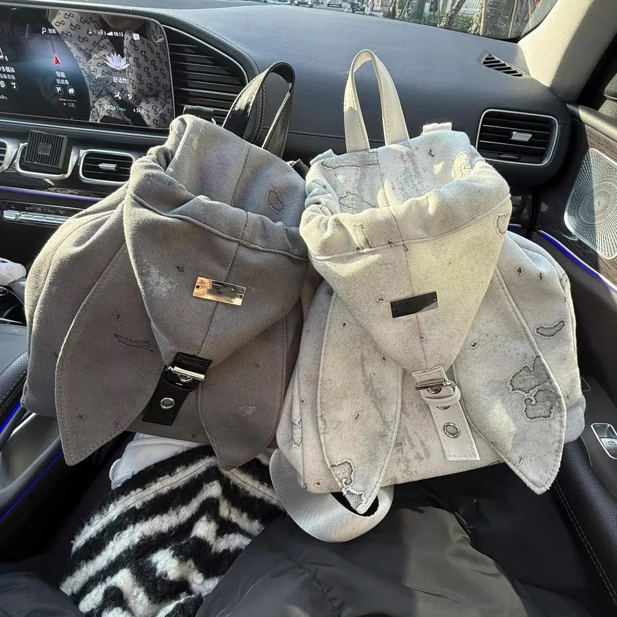 

Retro Cute Rabbit Ear Backpack 2025 Niche Design Drawstring Large Capacity Diagonal Cross Backpacks