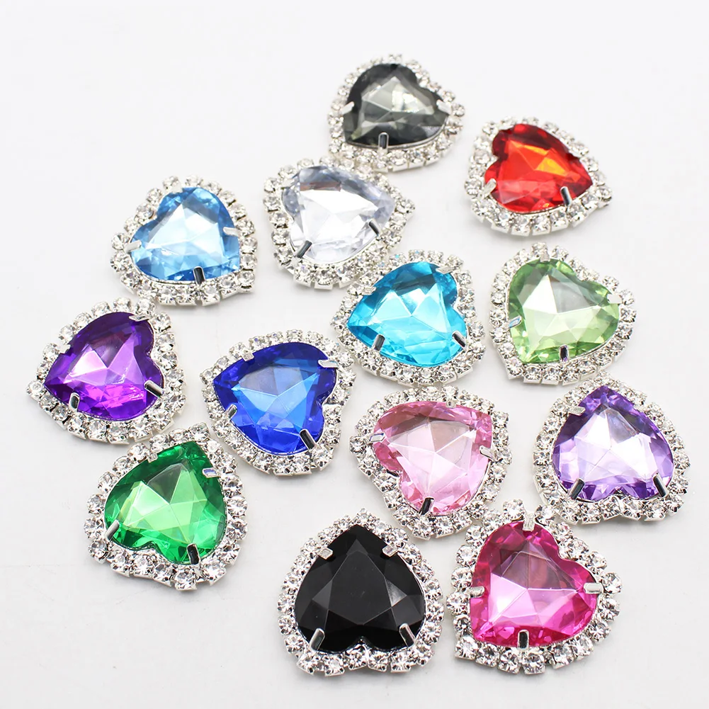 The new 5PCS large 32 * 33mm acrylic heart shaped diamond button with flat back and four holes can be sewn on the clothes