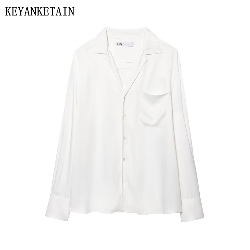 

KEYANKETIAN 2025 Spring/Autumn New Women's White satin shirt Simple style Pockets Single Breasted Long Sleeve Blouses Casual Top