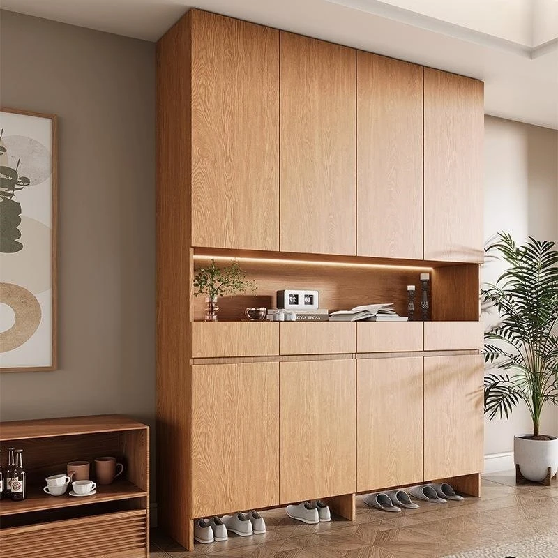 Solid wood door shoe cabinet integrated against the wall Home entrance shoe changing stool