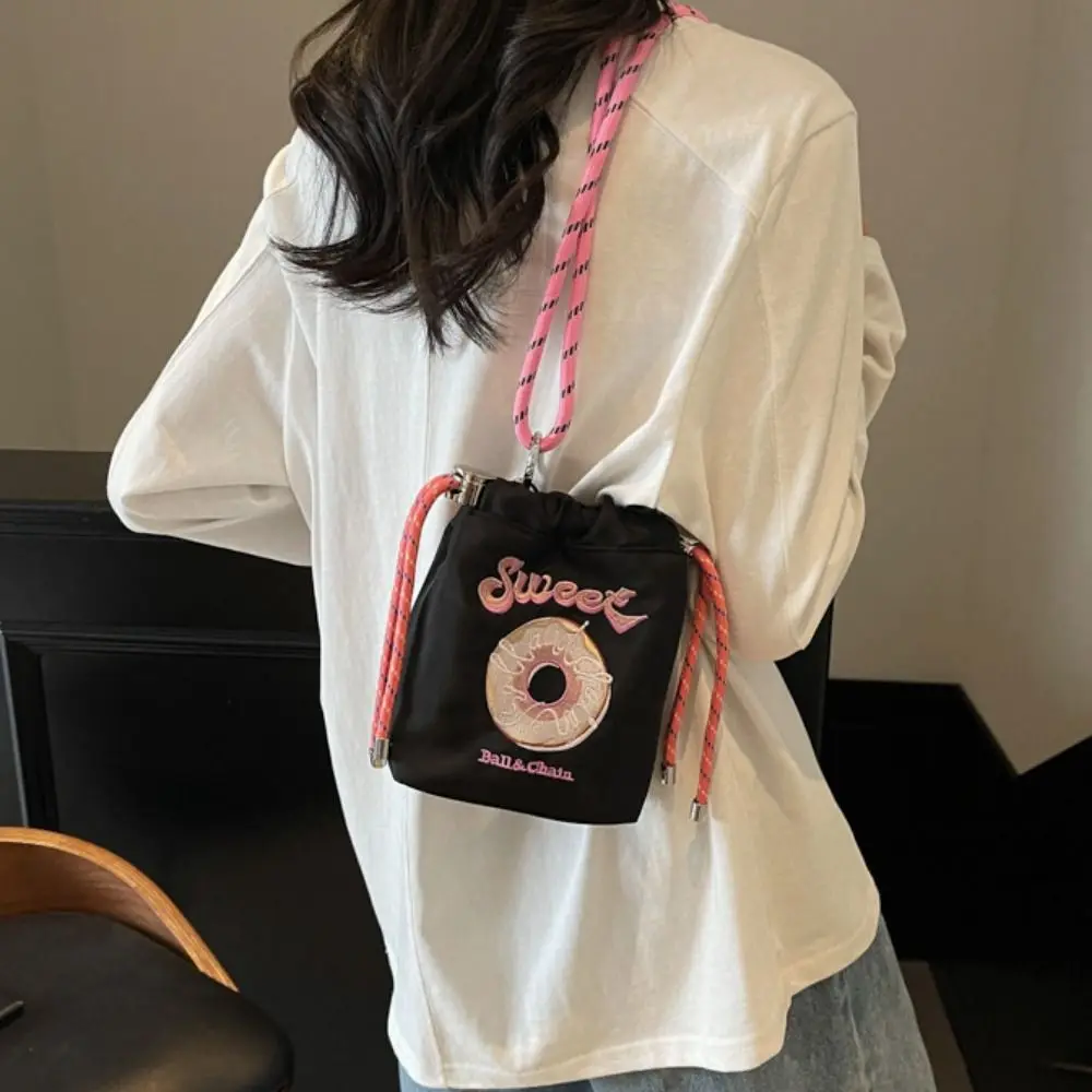 

Sweet Drawstring Bucket Bag Doughnut Pattern Shoulder Strap Nylon Crossbody Bag Cute Pattern Embroidery Design Cute Phone Bag