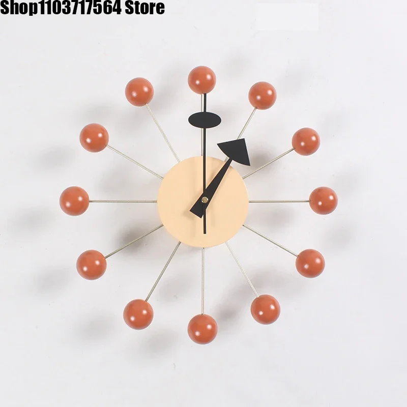 

Fashion clock background wall Famous designer wall clock Simple orange ball clock children's room candy wall clock