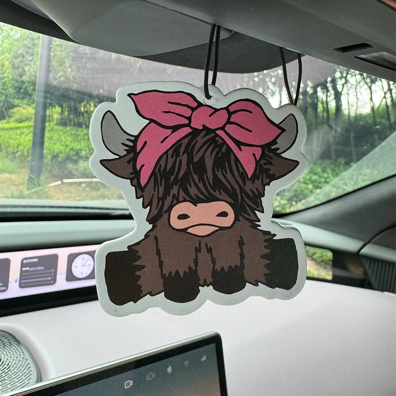 Cute Highland Cow Girl Cowgirl Intercontinental Hotel (Hotel Scent) Car Air Freshener |   Rearview Mirror Hanger & Dual-Purpose Air Vent Clip |   Natural Material Aromatherapy Tablets |   Long-Lasting Fragrance for 90 Days |   Alcohol-Free |   Not Afraid of Direct Exposure to the Sun |   Designed Specifically for Odor Removal in Cars, Closets, and Bathrooms. |   Cartoon Animation Graphics |   Unisex |   Luxury-Grade Fragrance |   Five-Star Wine