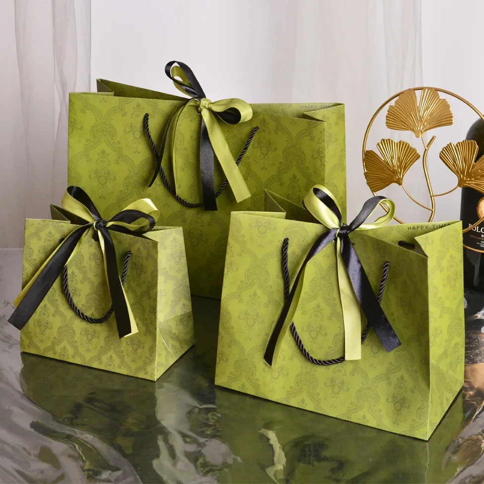 

Green Mid-Autumn Festival gift bag, gift packaging bag, light luxury clothing bags, candy storage bags, free ribbon.