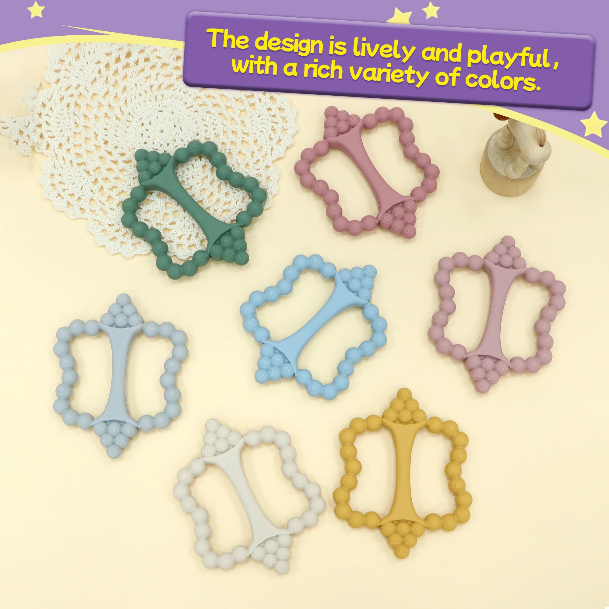 Jouet de dentition en silicone en forme de raisin pour bébés, facile à tenir, adapté aux bébés pendant la dentition, un incontournable pour les nouveaux parents.