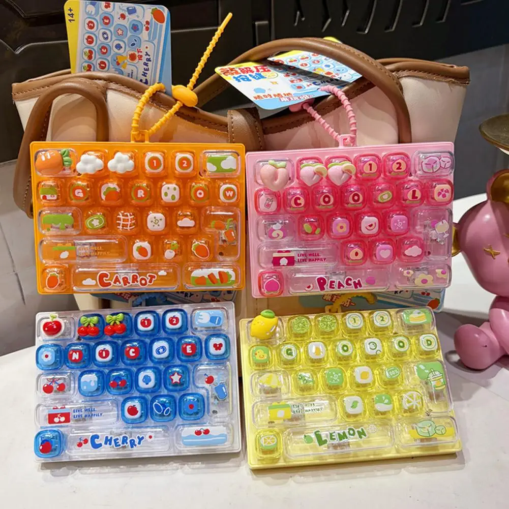 brinquedo-antiestresse-fofo-em-forma-de-teclado-com-26-teclas-chaveiro-pingente-perfeito-para-bolsa-presente-antiestresse