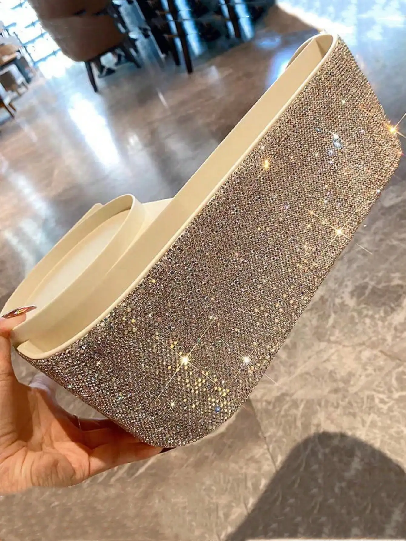 One artificial diamond-encrusted makeup brush and a drawer-style storage box for skin care products