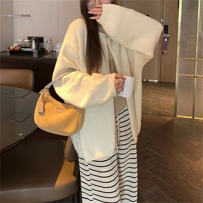 Women's Polka Dot Cardigan side profile demonstrating mid-long length and relaxed oversized silhouette