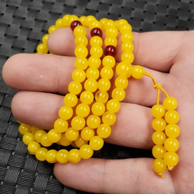 Minyak ayam kuning lilin madu gelang Multi lingkaran 108 manik-manik Buddha rantai Sweater pria dan wanita