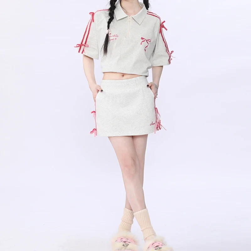 Summer New American Velvet Pink Bow Leisure Sports Suit Female Street Joker Short-Sleeved Skirt Sweet And Cool Two-Piece Suit