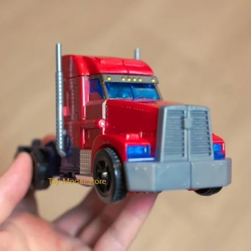 Op voorraad Transformatie APC-speelgoed Japanse kleuraanpassing Optimus Prime Action Robot Collectible Figures Model Verjaardag Kid Gifts