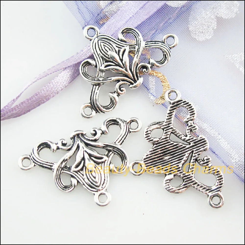 20 nuovi connettori triangolo fiore argento tibetano Charms colore 20x31mm