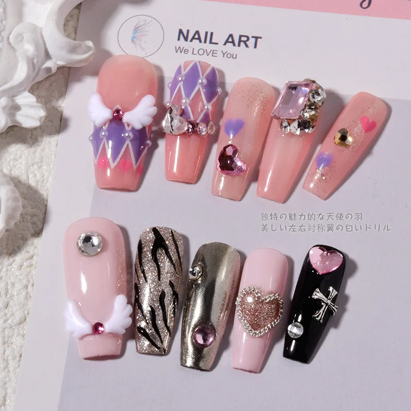 50 pz Nail Ali d'angelo Gioielli in resina 3D Polvere bianca Mini Nail Cahrms Fai da te Sinistra Destra Decorazioni per manicure Accessori Farfalla