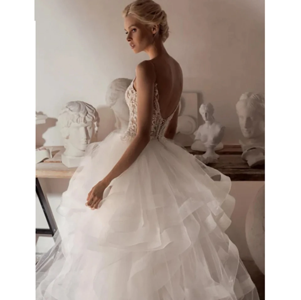 Customized Spaghetti Straps V-Neck Sleeveless A-line Wedding Dresses 2026 Open Back Tulle Lace Applique Floor Length Bridal Gown