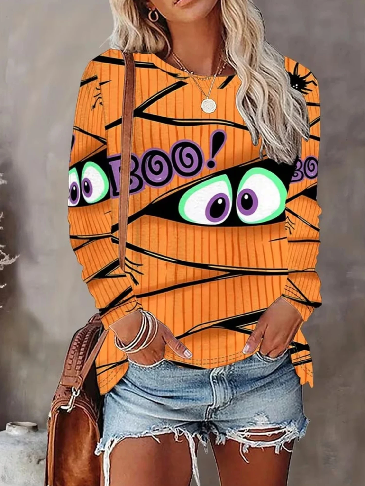 Damen-Halloween-T-Shirt, Rundhalsausschnitt, lange Ärmel, orange, Mumienauge, Boo-Buchstaben-Print, lockere Passform, Halloween-Freizeit- und Alltagsmode. – Detail 3