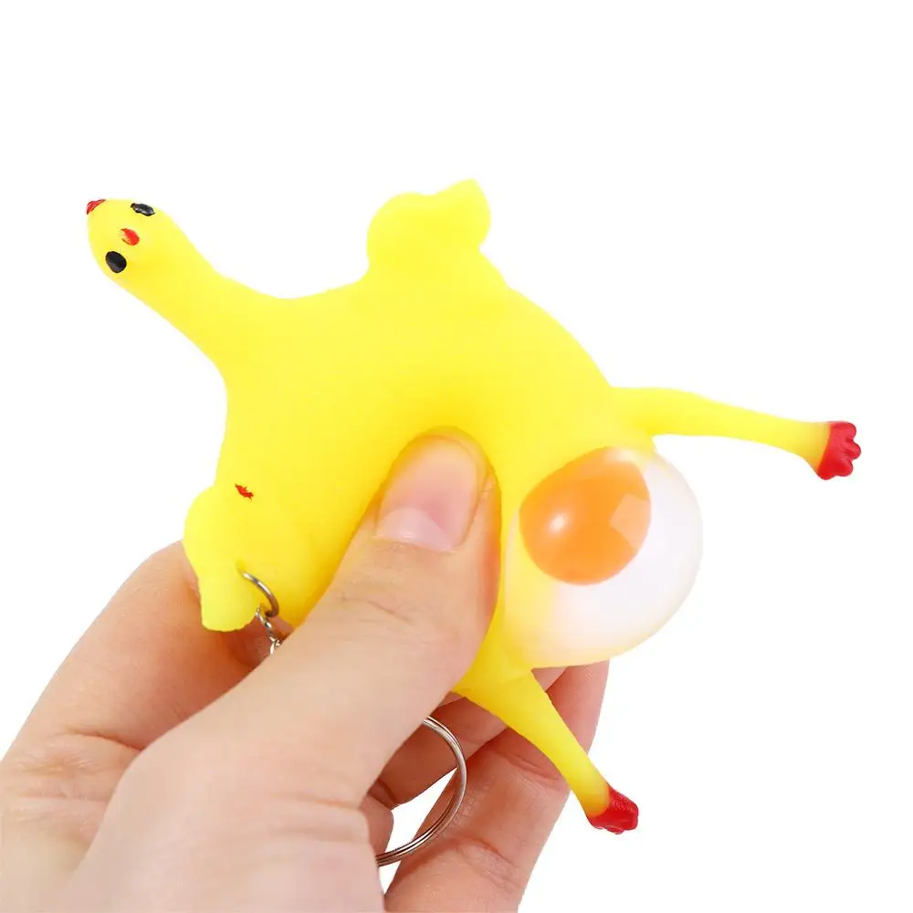 Regalo per bambini Vendita calda Trucco Scherzi divertenti Creatore Parodia Giocattolo Bavaglio Scherzi pratici Pollo che posa Uova Giocattoli ingannevoli Portachiavi