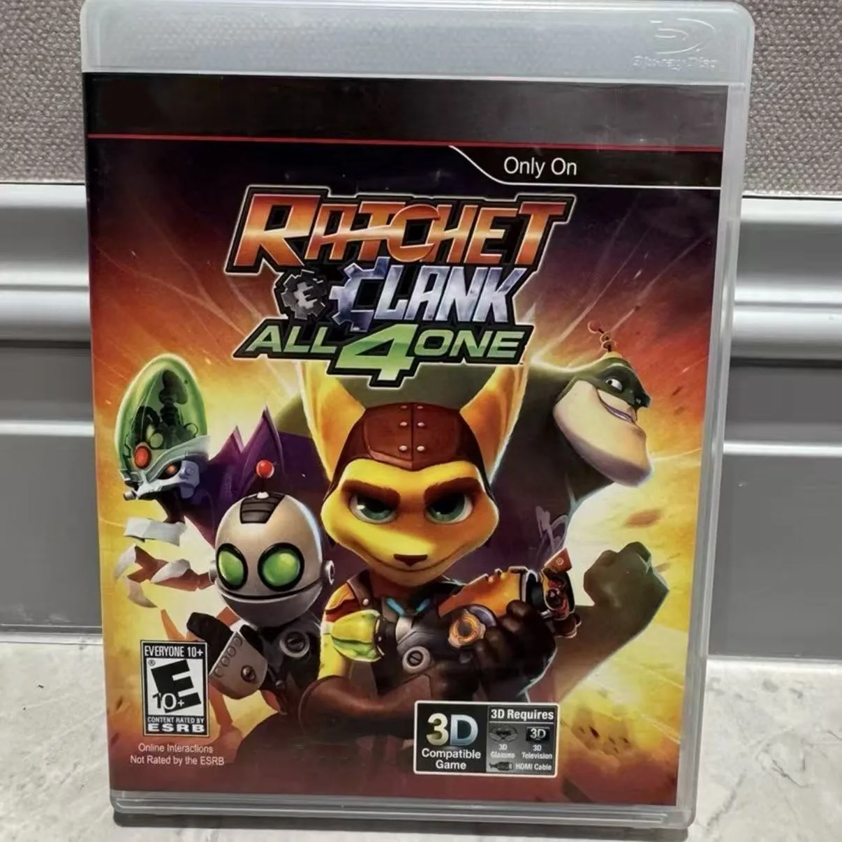 Disco de juego auténtico usado para Sony PS3: Ratchet & Clank: All 4 One, versión estadounidense, con manual.