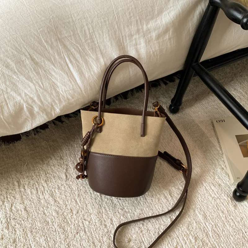 

Новинка 2023 года, двухцветная женская сумка-ведро, лоскутная сумка через плечо на шнурке, сумка через плечо с цветными блоками, повседневная шикарная и универсальная ​