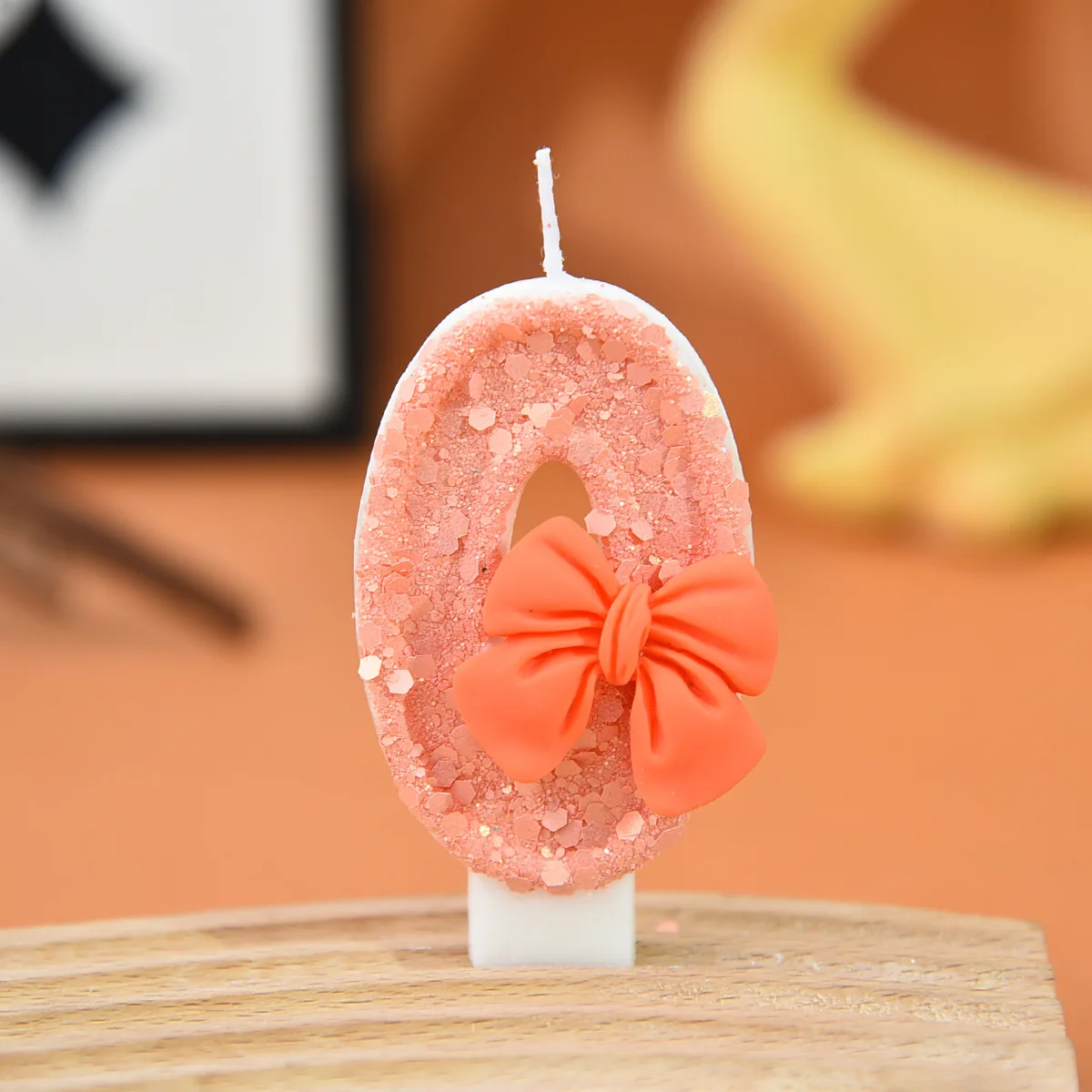 Peach powder sequin three-dimensional orange bow digital candle, suitable for party gifts, birthdays and anniversaries.