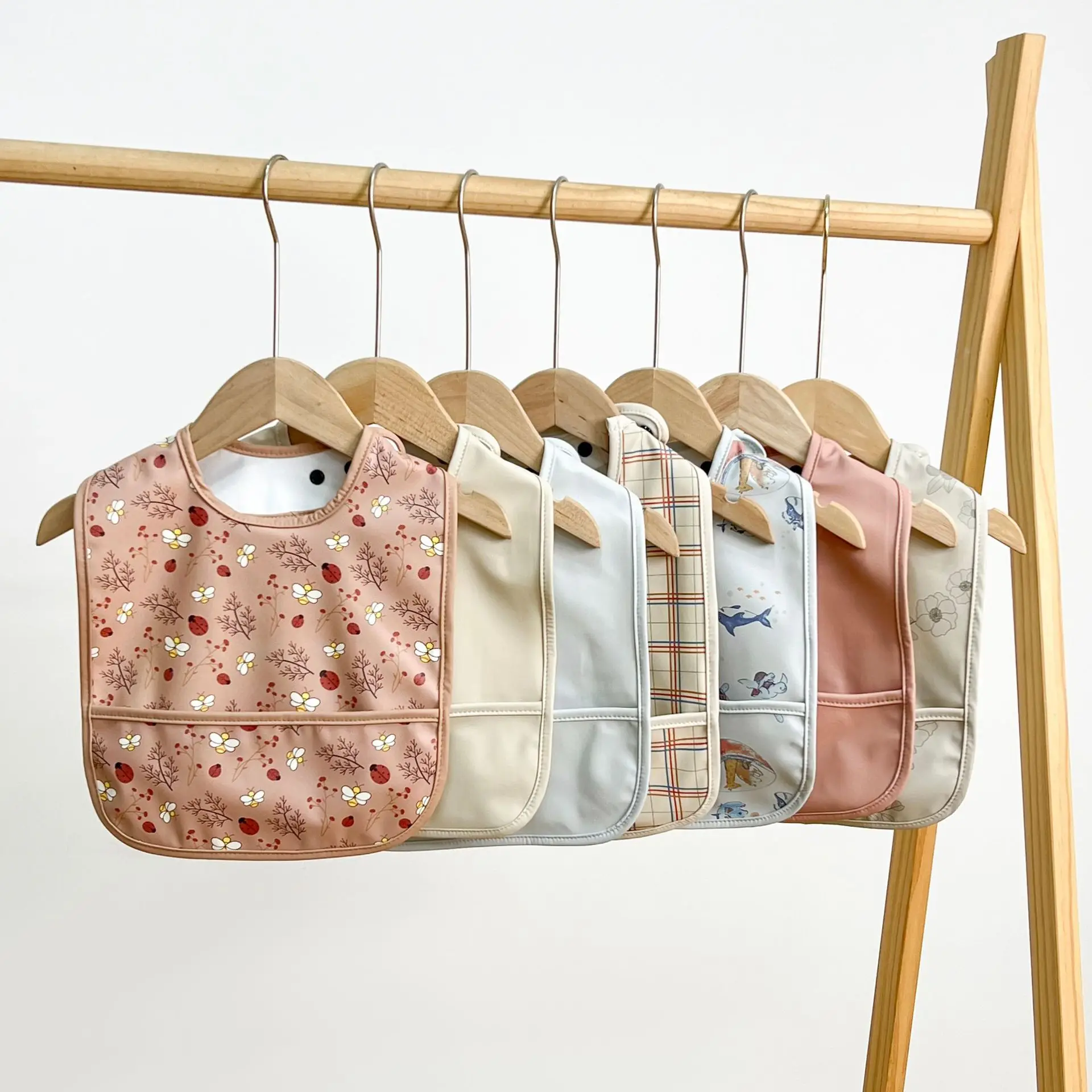 New European Baby Bibs Waterproof PU Feeding Cartoon Print Infant Baby Burp Cloths Sleeveless Drool Pocket Vests for Toddler