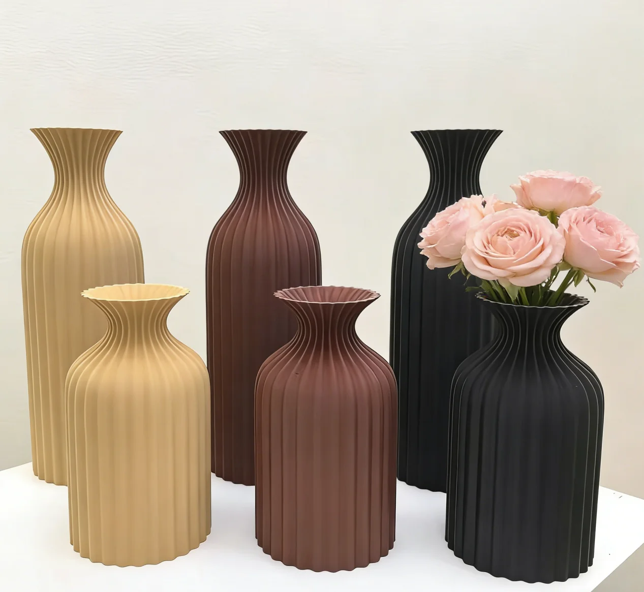 Black. Red-brown. Light tan. Plastic vase. Bohemian-style decorative item, suitable for use in homes, offices, and living rooms.