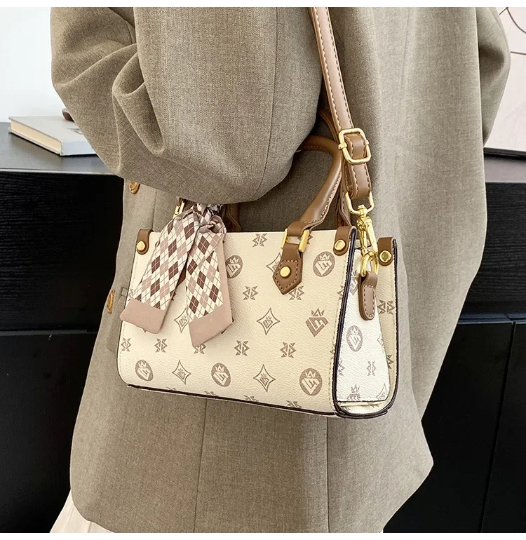 2025年新作テクスチャードハンドバッグ、レトロプリントショルダーバッグ、ニッチデザインクロスボディバッグ（女性用）