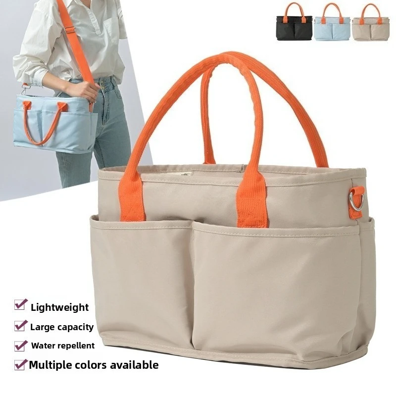 حقيبة الأم ذات السعة الكبيرة يمكن أن تكون مقطورة حقيبة الأم والطفل عصرية وخفيفة الوزن وحقيبة ساعي بكتف واحد #1