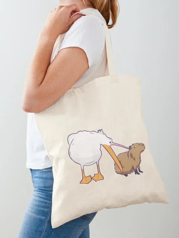 Pelican Tries to Eat Capybara Funny Cute Meme Tote Bag Cloth bag Women's bags Bag