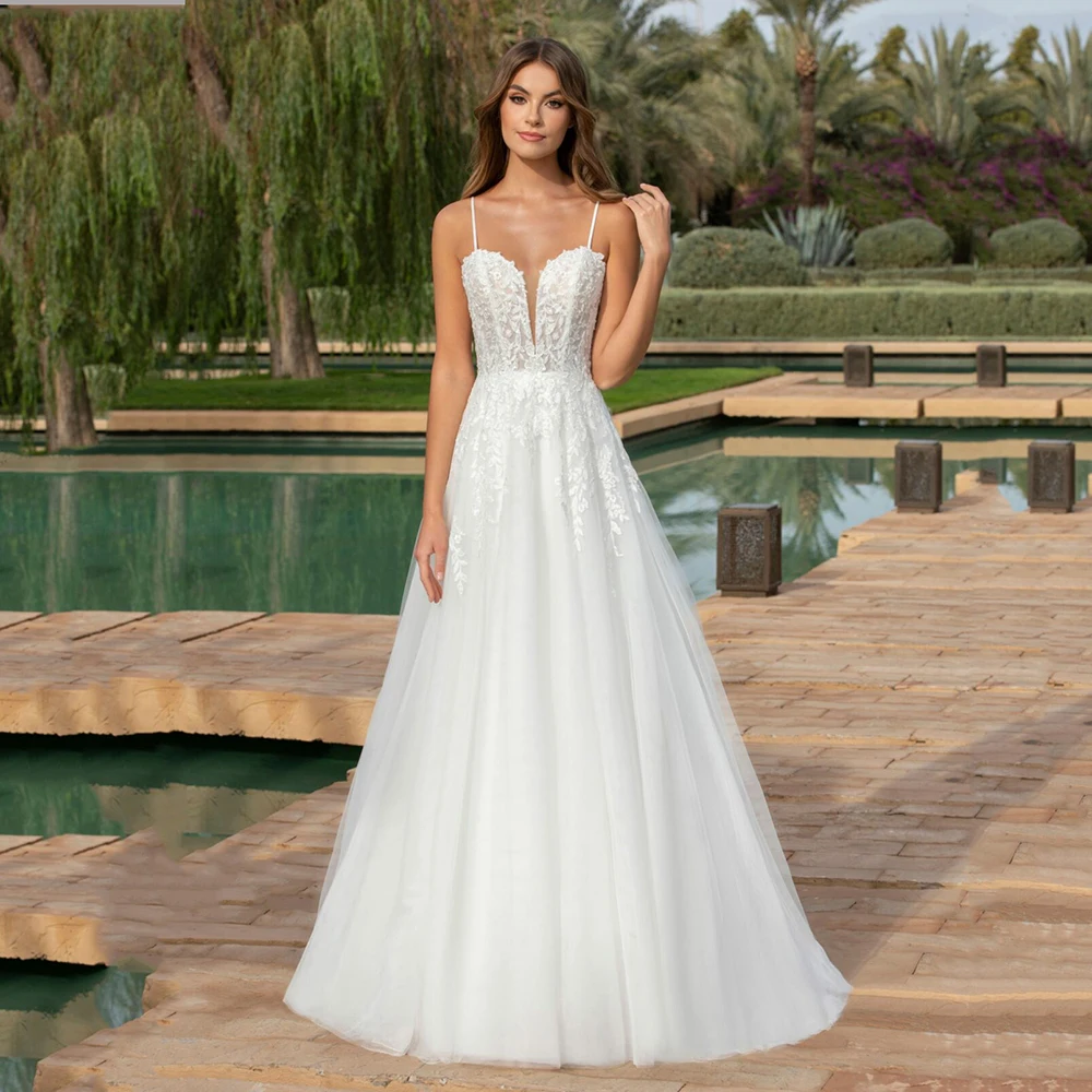 

Lace A-Line White Wedding Dresses Spaghetti Strap V Neck Tulle Bridal Dresses Backless Customized 2025 Long Brides Dresses
