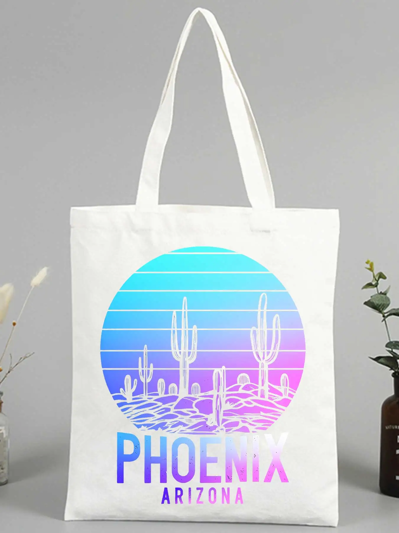 Women's desert cactus graphic canvas tote bag with retro sunset print, perfect for casual summer outings and daily shopping