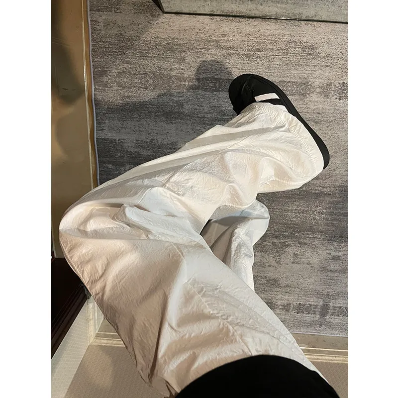 Pantaloni asciutti Qui in seta bianca di ghiaccio Pantaloni lunghi da assalto americani da uomo estivi sottili per paracadutista Sunade